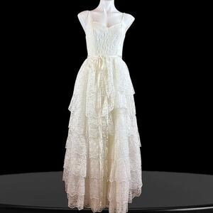 Vintage Wedding Dress Princess silhouette size 7
Union Made 1980s